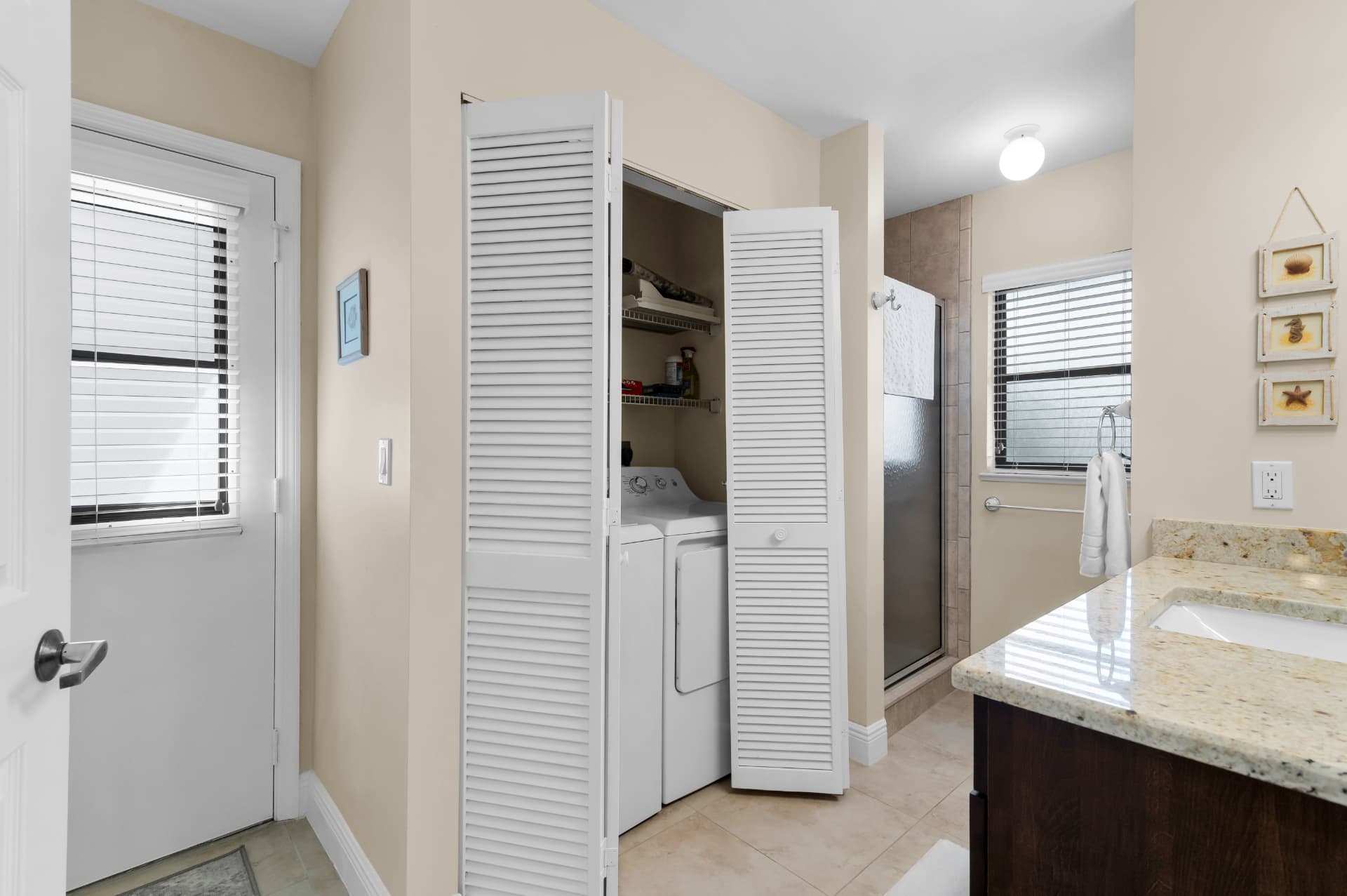 Laundry area with washer and dryer at Pirates Cove Marco Island