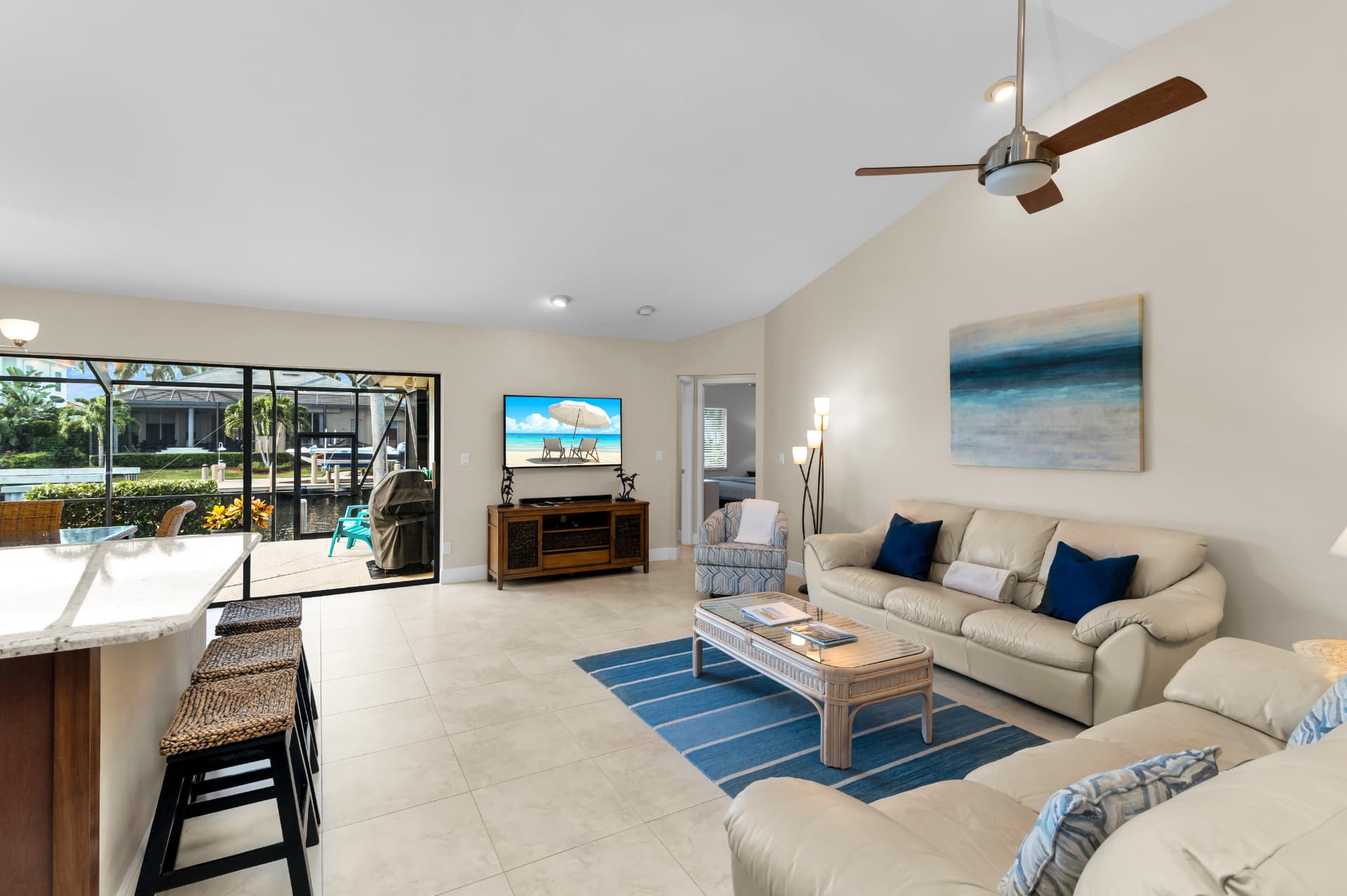 Second living room opening to the pool at Pirates Cove Marco Island