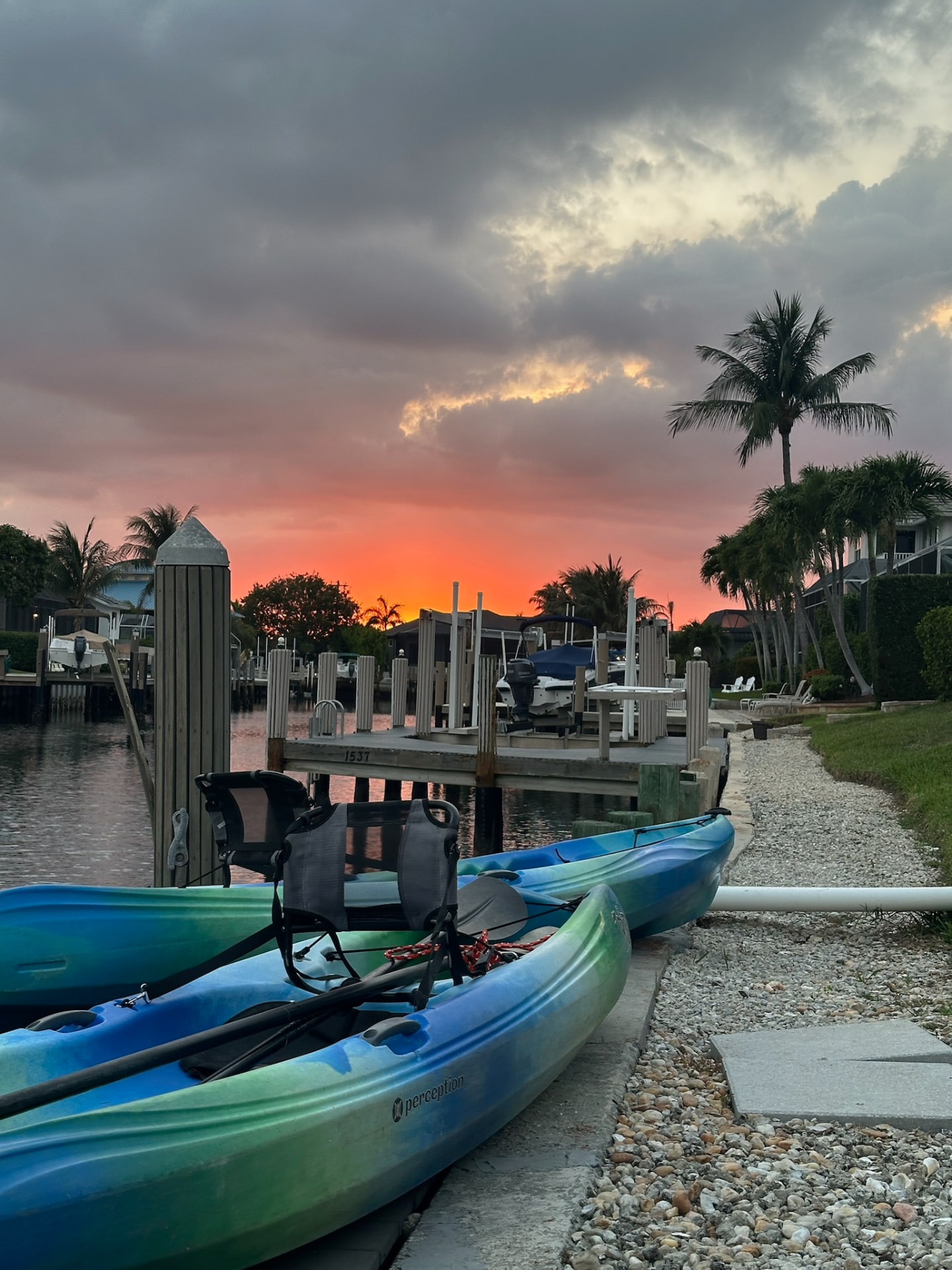 Kayaks beside the private dock at sunset at Pirates Cove Marco Island