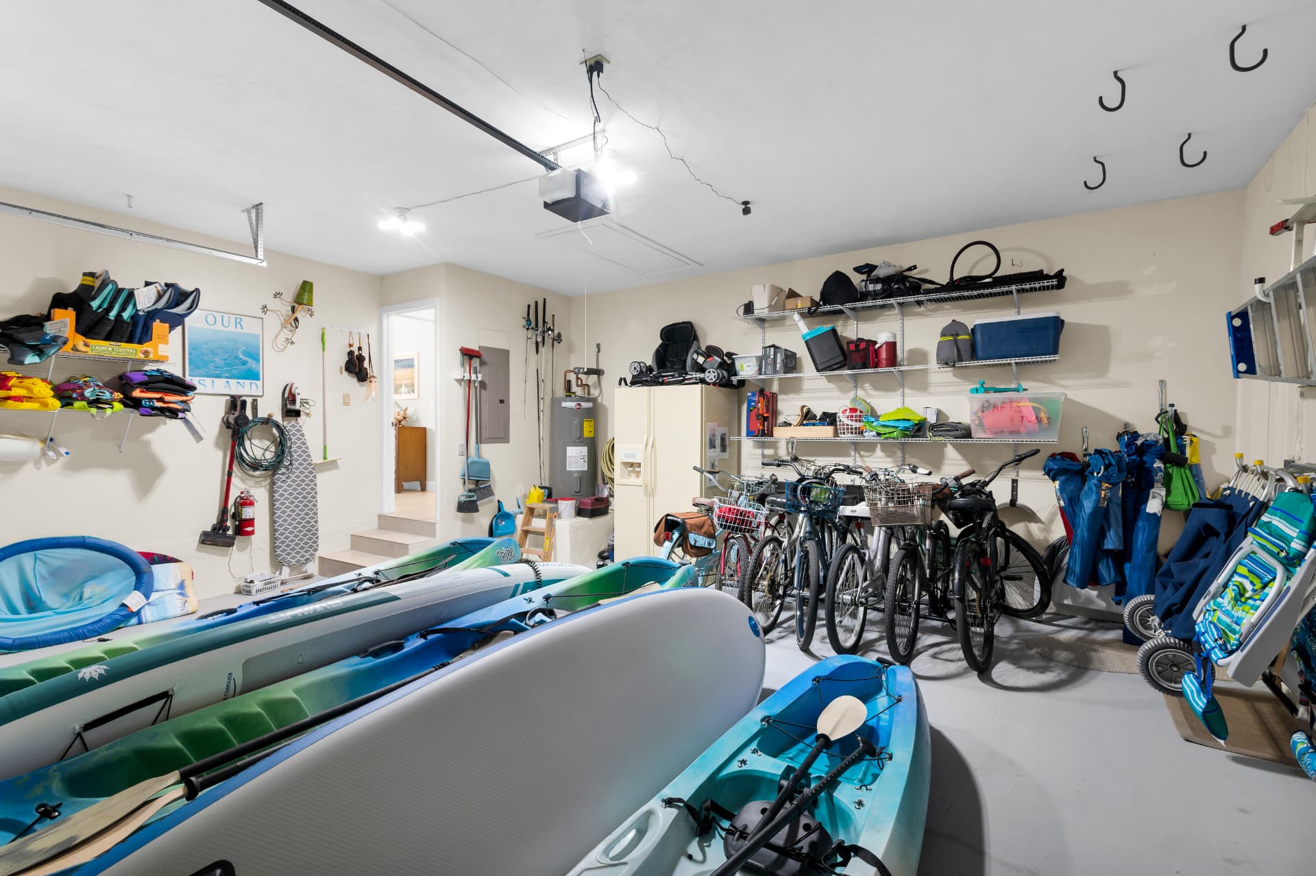 Garage stocked with bikes, kayaks, paddleboards and beach gear at Pirates Cove Marco Island