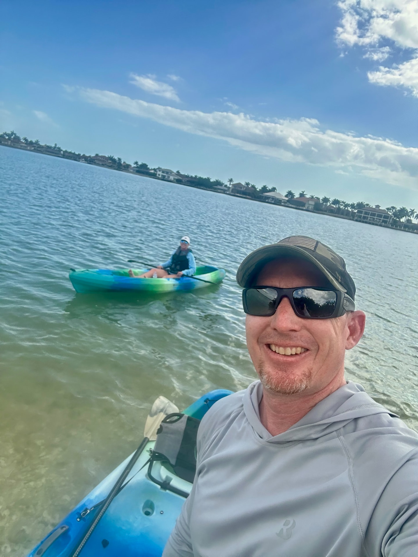 Travis and Jaime kayaking together near Pirates Cove Marco Island