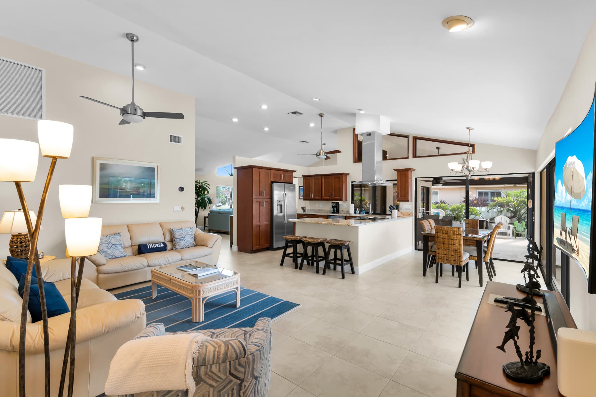 Living room, kitchen and dining area at Pirates Cove Marco Island