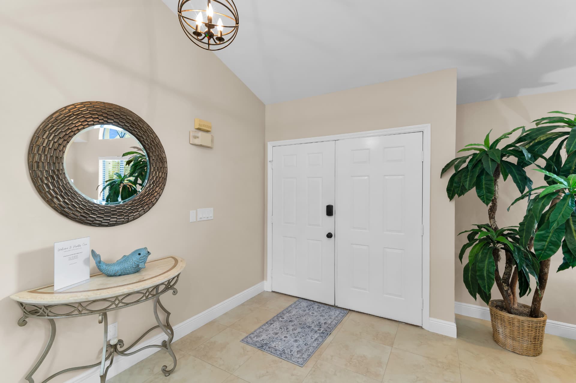 Entry foyer with double doors at Pirates Cove Marco Island