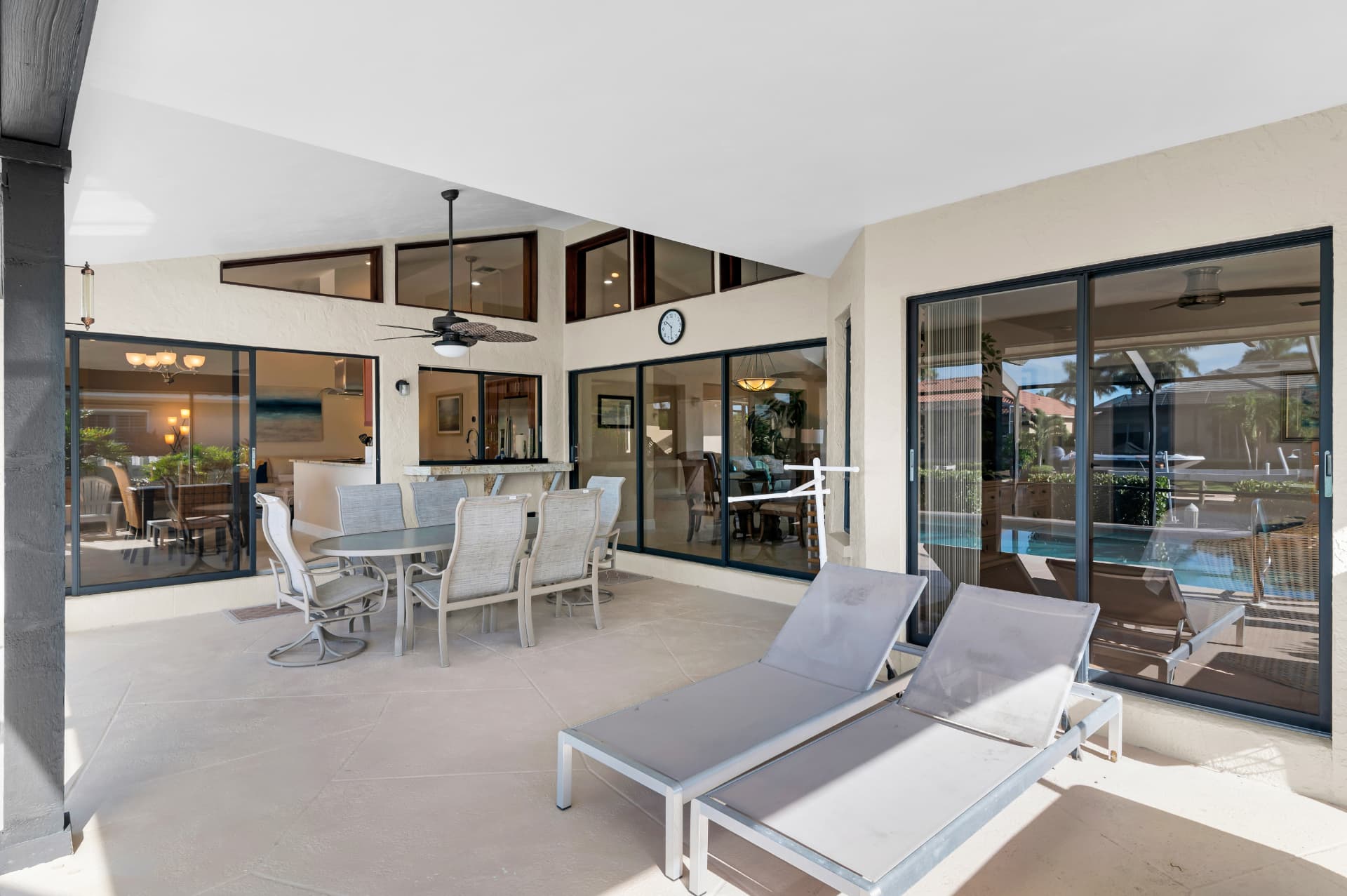 Pool terrace and outdoor dining table at Pirates Cove Marco Island